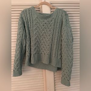 Knitted turquoise sweater